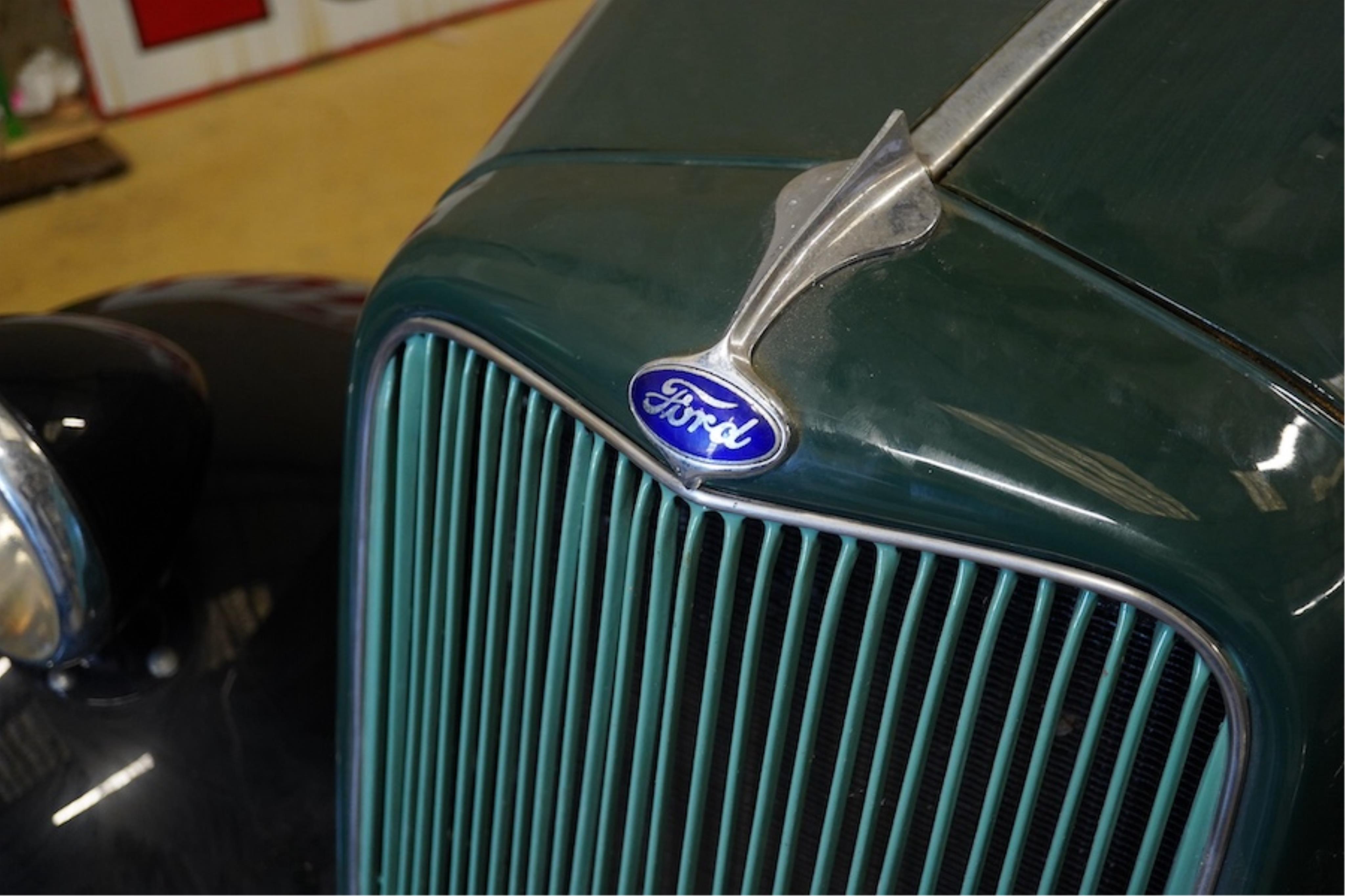 A 1936 Ford Model Y saloon, reg. no. CYM868, 885cc, dark green, odometer showing 93,057 miles. Restored by the late owner, to a very high standard and winner of seven Concours d’Elegance awards